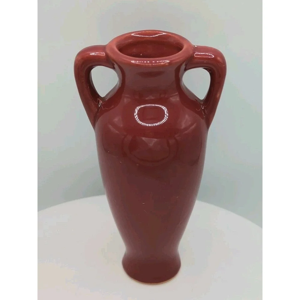 Unmarked burgundy pottery